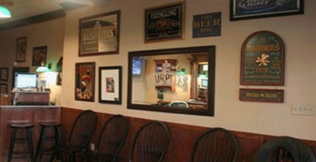 Interior image of the mirror wall in VanRyn's Barber shop in West Chester, PA